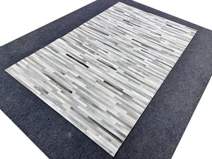 Modern Striped Cowhide Rug – Handmade Hair-On Leather Patchwork Carpet for Living Room Décor - Alef home