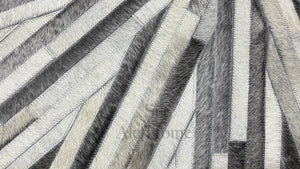 Handmade Starburst Cowhide Rug: Round Patchwork Leather Carpet with Wool Backing - Alef home