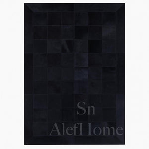 Handmade Black Cowhide Patchwork Rug: Modern Hair-On Leather Carpet - Alef home