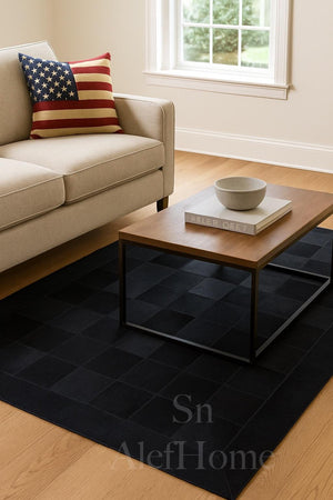 Handmade Black Cowhide Patchwork Rug: Modern Hair-On Leather Carpet - Alef home
