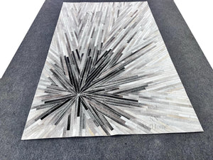 Handmade Starburst Cowhide Rug – Modern Geometric Hair-On Leather Patchwork Carpet for Home - Alef home