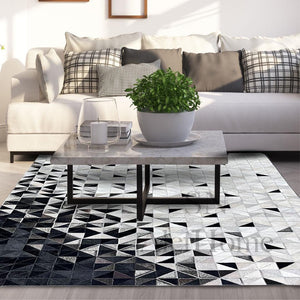 Large Black and White Cowhide Rug: Geometric Patchwork, Handmade 9.9x14 - Alef home