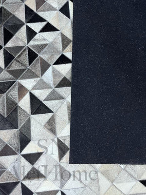 Large Black and White Cowhide Rug: Geometric Patchwork, Handmade 9.9x14 - Alef home