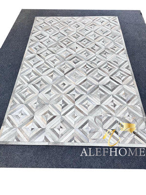 Luxury Grey Cowhide Area Rug – Handmade Geometric Patchwork Hair-On Leather Carpet for Home - Alef home