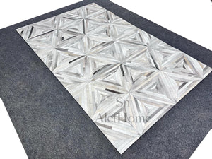 Grey Cowhide Starburst Rug – Handmade Hair-On Leather Patchwork Carpet for Modern Home Décor - Alef home