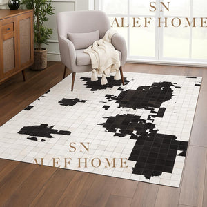 Black & White Cowhide Patchwork Rug – Handmade Hair-On Leather Carpet for Contemporary Home Décor - Alef home