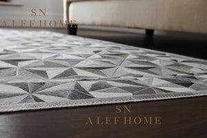 Modern Grey Cowhide Patchwork Rug: Hair-On Leather Design