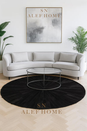 Handmade Black Cowhide Patchwork Rug: Hair-On Leather Carpet - Alef home