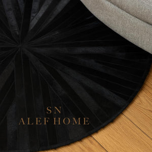 Handmade Black Cowhide Patchwork Rug: Hair-On Leather Carpet - Alef home