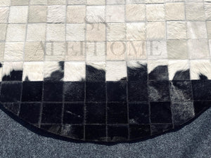 Handmade Round Cowhide Patchwork Rug: Black, White, and Natural Hair-On Leather Carpet - Alef home