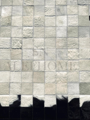 Handmade Round Cowhide Patchwork Rug: Black, White, and Natural Hair-On Leather Carpet - Alef home