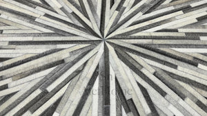 Handmade Starburst Cowhide Rug: Round Patchwork Leather Carpet with Wool Backing - Alef home