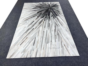 Handmade Starburst Cowhide Rug – Modern Geometric Hair-On Leather Patchwork Carpet for Home - Alef home