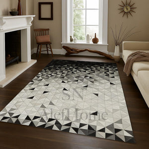 Large Black and White Cowhide Rug: Geometric Patchwork, Handmade 9.9x14 - Alef home