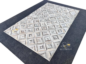 Handmade Grey Cowhide Patchwork Rug: Geometric Hair-On Leather - Alef home