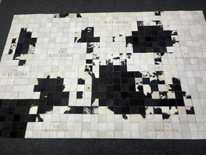 Black & White Cowhide Patchwork Rug – Handmade Hair-On Leather Carpet for Contemporary Home Décor - Alef home