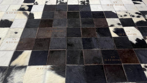 Black & White Cowhide Patchwork Rug – Handmade Hair-On Leather Carpet for Contemporary Home Décor