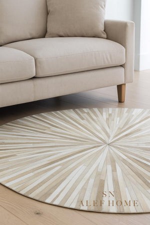 Handmade Beige Cowhide Rug: Round Leather Patchwork Carpet - Alef home