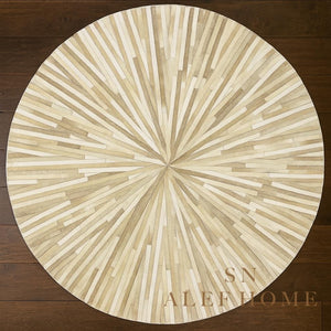 Handmade Beige Cowhide Rug: Round Leather Patchwork Carpet - Alef home