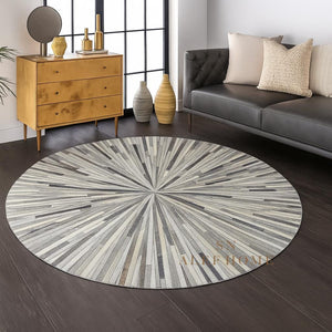 Handmade Starburst Cowhide Rug: Round Patchwork Leather Carpet with Wool Backing - Alef home