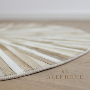 Handmade Beige Cowhide Rug: Round Leather Patchwork Carpet - Alef home