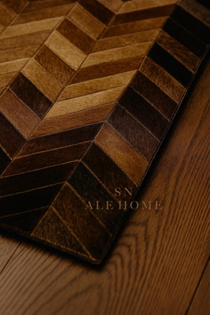 Chevron Cowhide Rug: Handmade Patchwork Leather Carpet - Brown & Black - Alef home