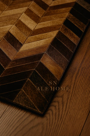 Chevron Cowhide Rug: Handmade Patchwork Leather Carpet - Brown & Black - Alef home