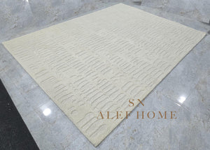 Handmade Ivory Wool Rug: Scandinavian Textured Cut & Loop Pile - Alef home