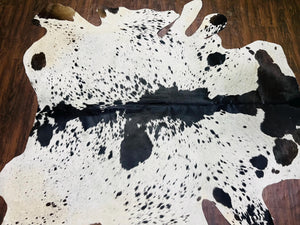 Black & White Cowhide Patchwork Rug: Hair-On Leather Farmhouse Decor - Alef home