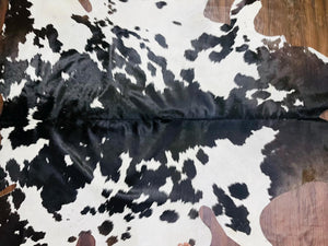 Handmade Black & White Cowhide Patchwork Rug: Hair-On Leather Carpet - Alef home
