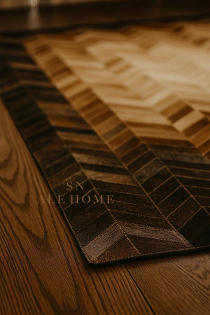 Chevron Cowhide Rug: Handmade Patchwork Leather Carpet - Brown & Black - Alef home