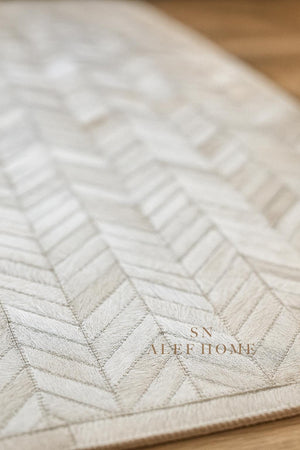 Handmade White Cowhide Rug: Chevron Patchwork, Hair-On Leather Carpet - Alef home