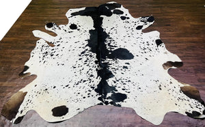 Black & White Cowhide Patchwork Rug: Hair-On Leather Farmhouse Decor - Alef home