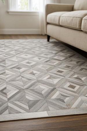 Geometric Cowhide Patchwork Rug: Handmade Hair-On Leather Carpet - Alef home