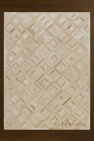 Geometric Cowhide Patchwork Rug: Beige Hair-On Leather, Handmade - Alef home