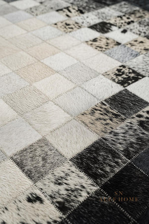 Black and White Cowhide Patchwork Rug: Handmade Hair-On Leather - Alef home
