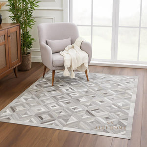 Geometric Cowhide Patchwork Rug: Handmade Hair-On Leather Carpet - Alef home