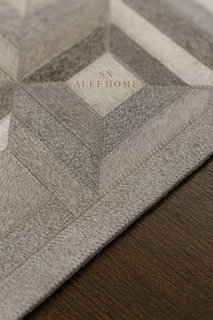 Geometric Cowhide Patchwork Rug: Handmade Hair-On Leather Carpet - Alef home
