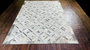 Geometric Cowhide Patchwork Rug: Handmade Hair-On Leather Carpet - Alef home