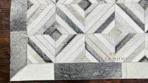 Geometric Cowhide Patchwork Rug: Handmade Hair-On Leather Carpet - Alef home