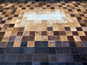 Handmade Cowhide Patchwork Rug: Gradient Brown & Beige Leather Carpet - Alef home