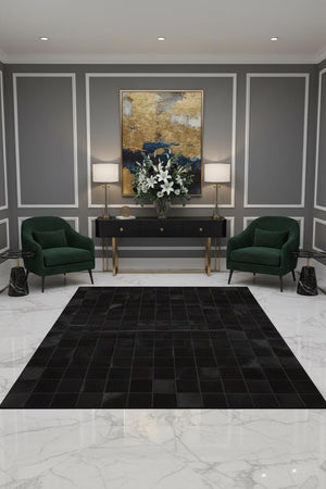 Black Cowhide Checkerboard Rug: Handmade Hair-On Leather Patchwork Carpet - Alef home
