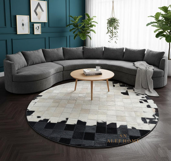 Handmade Round Cowhide Patchwork Rug: Black, White, and Natural Hair-On Leather Carpet - Alef home