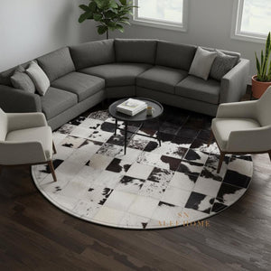 Handmade Cowhide Patchwork Rug: Round Black & White Leather Carpet - Alef home