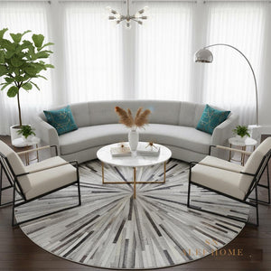 Handmade Starburst Cowhide Rug: Round Patchwork Leather Carpet with Wool Backing - Alef home