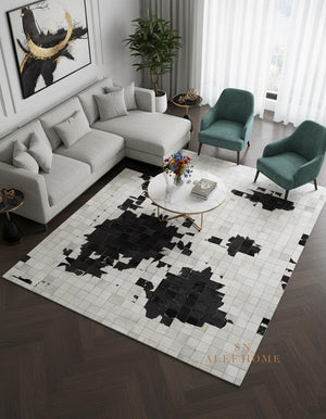 Black & White Cowhide Patchwork Rug – Handmade Hair-On Leather Carpet for Contemporary Home Décor