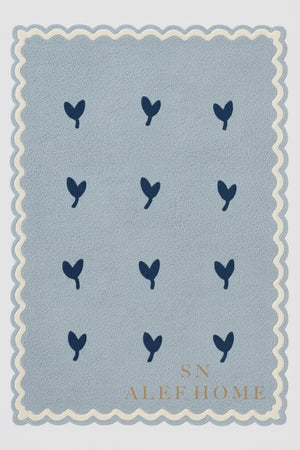 Handmade Pastel Blue Wool Rug – Scalloped Leaf Pattern Carpet for Nursery & Kids Room - Alef home